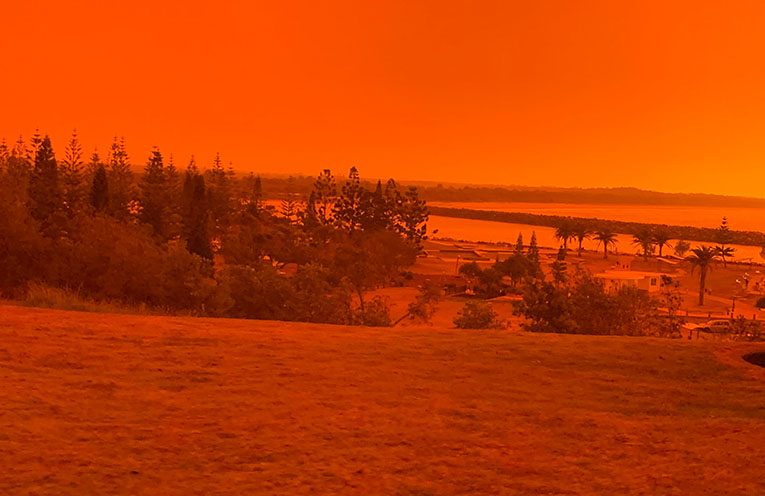 Bushfire survivors urge Albanese Government to impose climate levy on coal and gas after national risk report