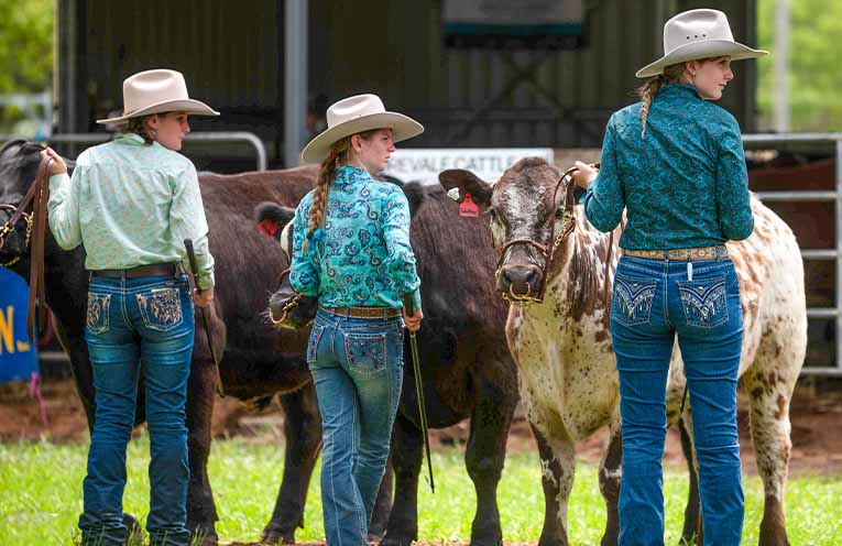 Young ag enthusiasts show impressive control over their cattle.  Photo: Kim Ambrose/SaltyFoxFotography.