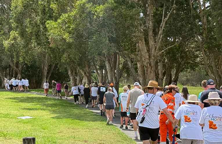 Walkers choose hope as they make their way to Stingray Creek Bridge.
