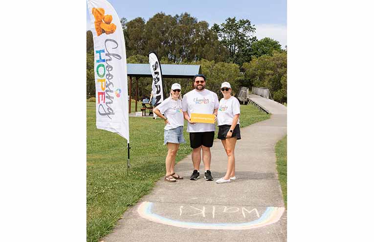 Michelle Freeman with supporters Luke Hadfield and Chan Ansell.