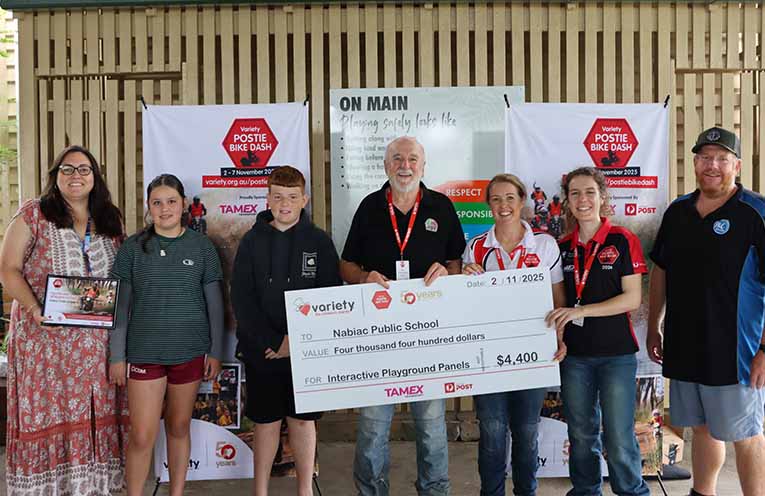 Nabiac Public School gets the first cheque of the ride. Photo: supplied.