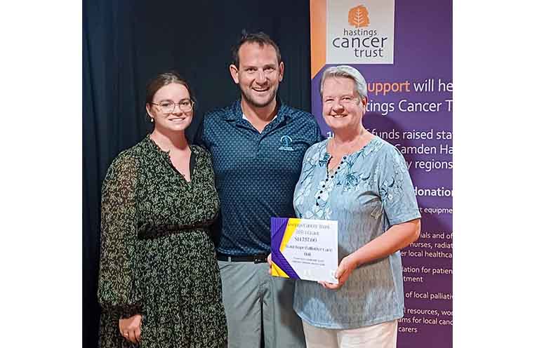 Mary Trotter, Wauchope Palliative Care Unit, accepts the grant certificate from Brendon and Kate Roods at the 2024 awards. Photo: supplied
