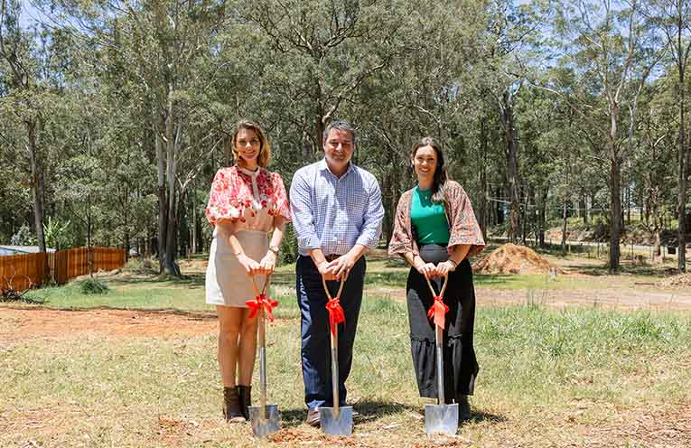 Federal Member for Cowper Pat Conaghan breaks ground alongside Steiner School founding parents Mel Ayriss and Alanna Alfaro. Photo: supplied.