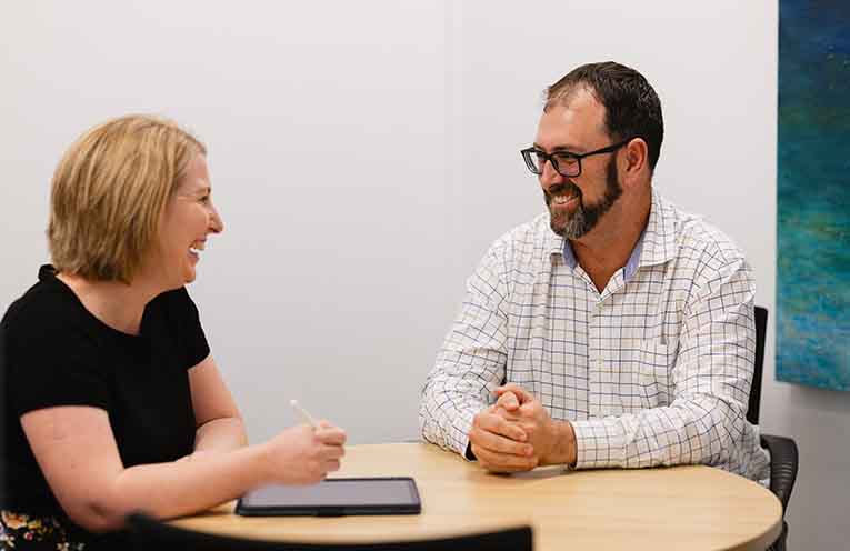 Tony and Natalie conversing.