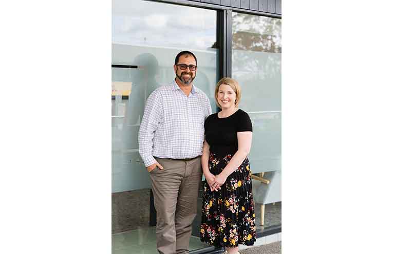 Tony and Natalie are all smiles for their clients.