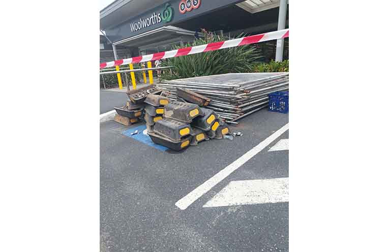 Materials stored in the disabled parking space.