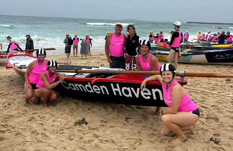 The women’s surf boat crew took on challenging surf conditions in Lake Macquarie. Photo: CHSLSC.