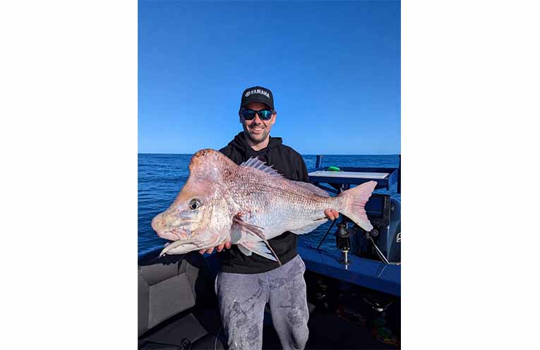 Carew Dickson with his 86cm snapper. Photo: Supplied.